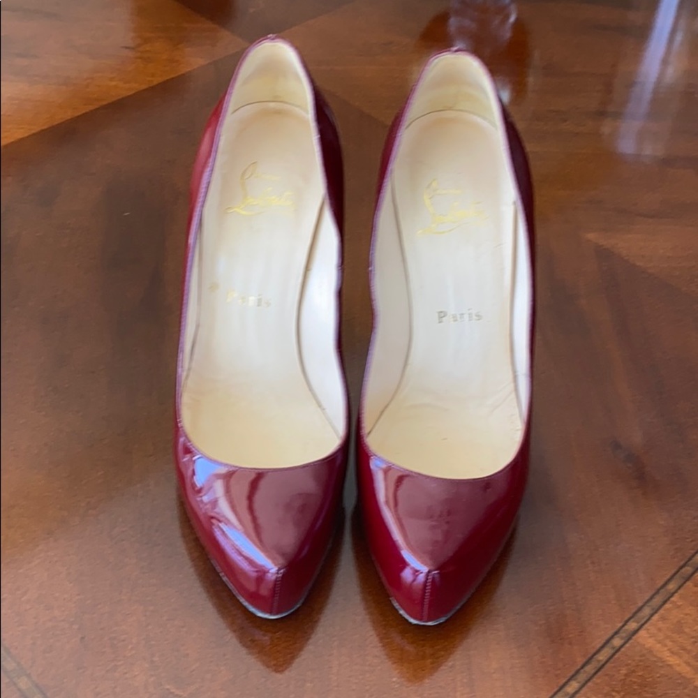 CHRISTIAN LOUBOUTIN | Oxblood Patent Rolando Pumps